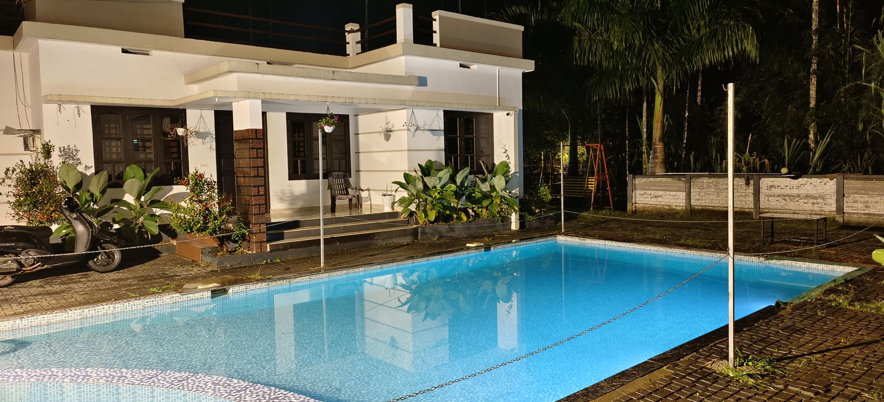 The pool at night with the lights on